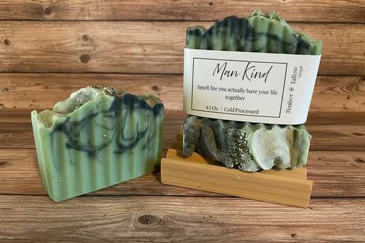 3 soaps on a tray with a wood background