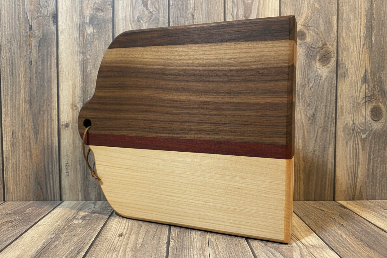 Wooden cutting board with a striped pattern on a wooden surface