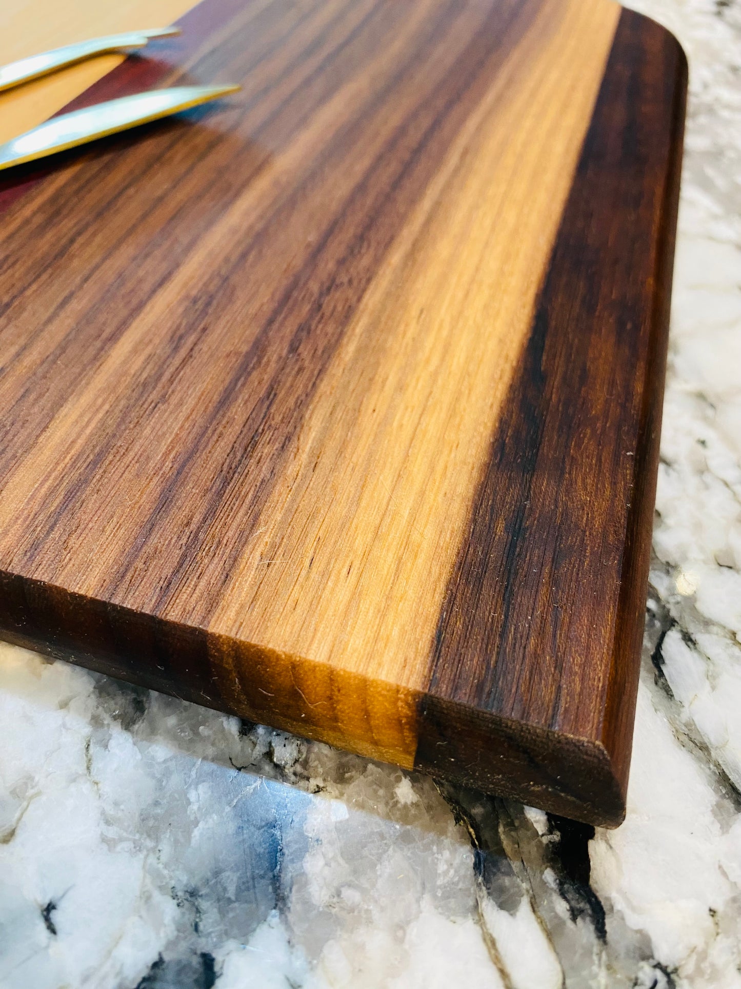 Exotic Wood - Baby Timber cutting board made with Maple, Paduak, Morado and Walnut