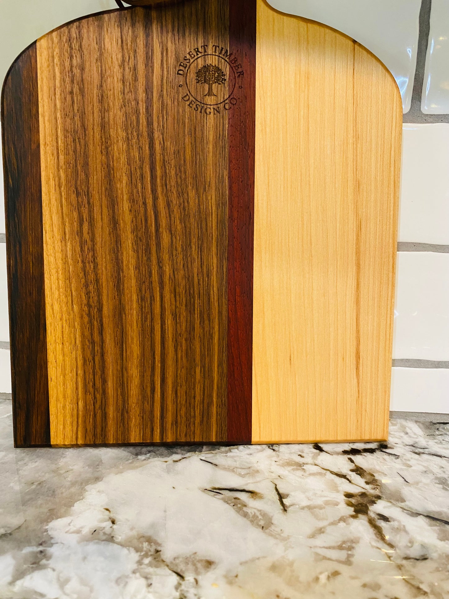 Exotic Wood - Baby Timber cutting board made with Maple, Paduak, Morado and Walnut