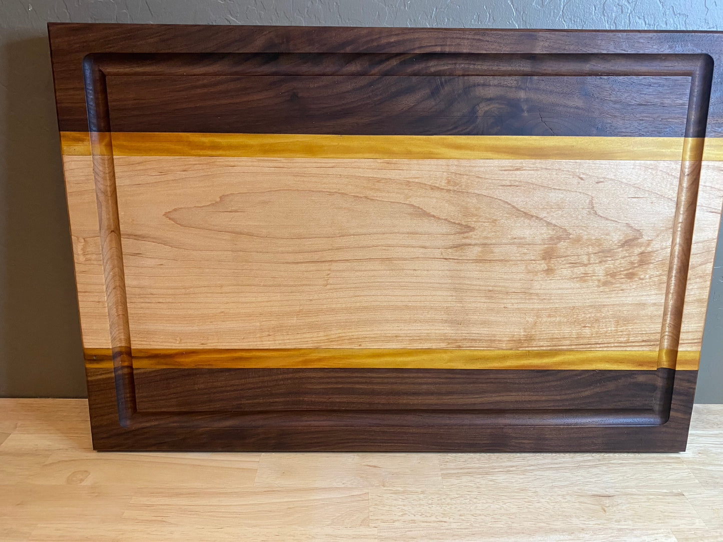 Walnut, Maple &amp; Yellow Heart Cutting Board — 1.25" Thick (Coming Soon)Inquire