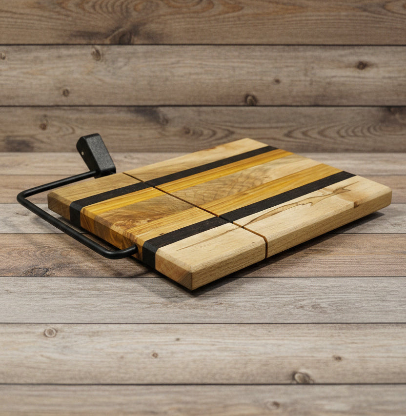 Wooden cutting board with black handle on a Wood slat background