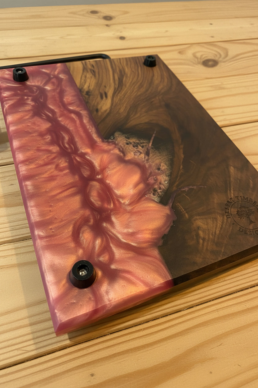Walnut & Pink Cheese cutter board on wood slat background