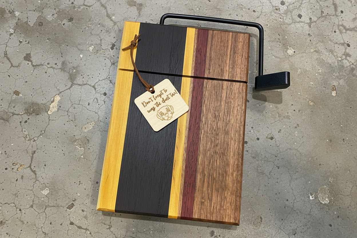 Wooden cutting board with a handle on a concrete surface